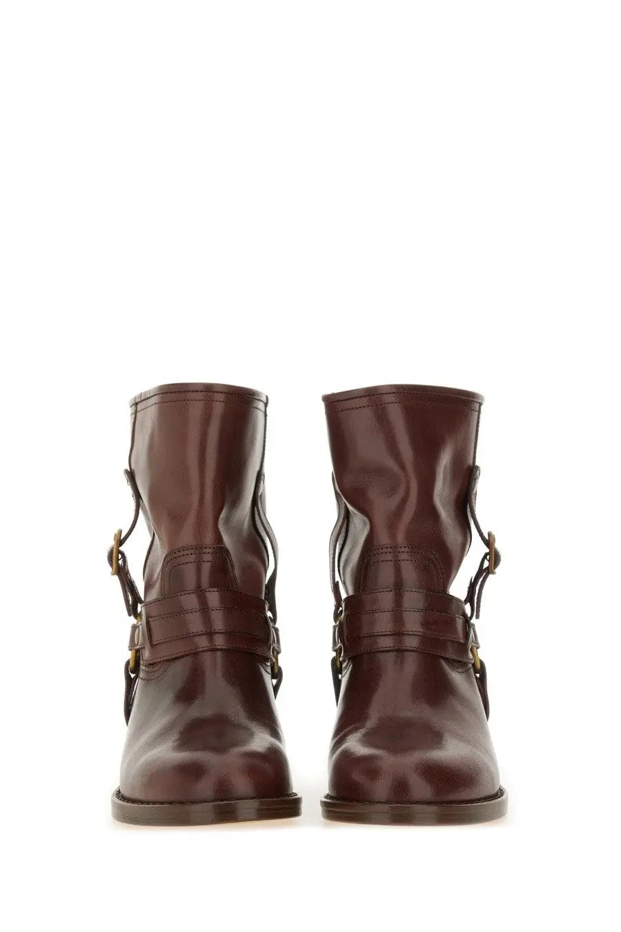 Isabel Marant women’s dark brown patent leather ankle boots with gold-tone buckle straps front view