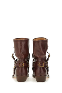 Isabel Marant women’s brown leather ankle boots with gold-tone buckle straps for stylish wear