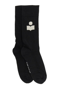 Isabel Marant women’s black crew socks with white embroidered logo of a stylized figure reading a book