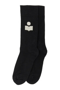 Isabel Marant women’s black crew socks with white embroidered logo of a stylized person reading a book