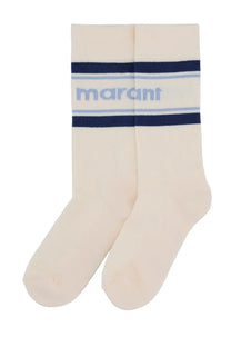 Cream-colored isabel marant women’s dona socks with navy and light blue stripes across the top front view