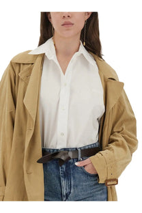 Tan trench coat with belted waist and adjustable cuffs shown from the back in Isabel Marant women’s Fabriza shirt white product