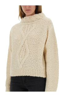 Isabel Marant women’s cream-colored chunky knit sweater with high turtleneck and cable-knit chest pattern
