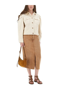 Tan suede crescent-shaped handbag with top handle and adjustable shoulder strap paired with Isabel Marant beige jacket