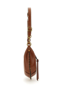 Isabel Marant women’s oskan moon shoulder bag brown leather with gold-tone hardware and decorative tassel