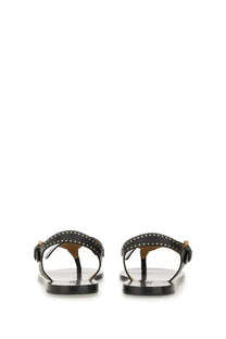 Isabel Marant women’s black leather thong sandals with gold-tone studs and buckle details