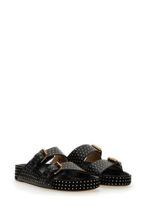 Isabel Marant women’s black leather sandals with white polka dots and gold-tone buckles visible from the back