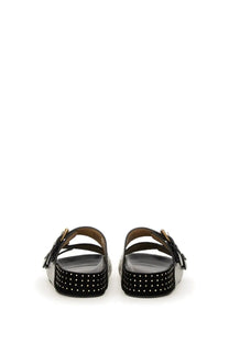 Isabel Marant women’s black platform sandals with textured upper silver studs and gold-tone buckle details