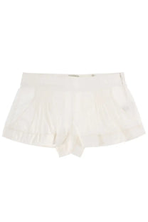 Isabel Marant women’s white pleated shorts with ruffled hem and side pockets made from lightweight fabric