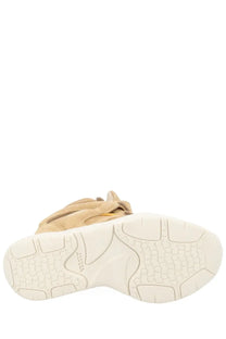 Isabel Marant women’s beige suede high-top sneaker with white rubber sole and textured tread pattern