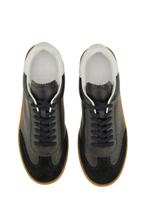 Isabel Marant women’s sneaker Bryce black with black and dark gray suede leather, white laces, tan rubber sole, and perforated detailing