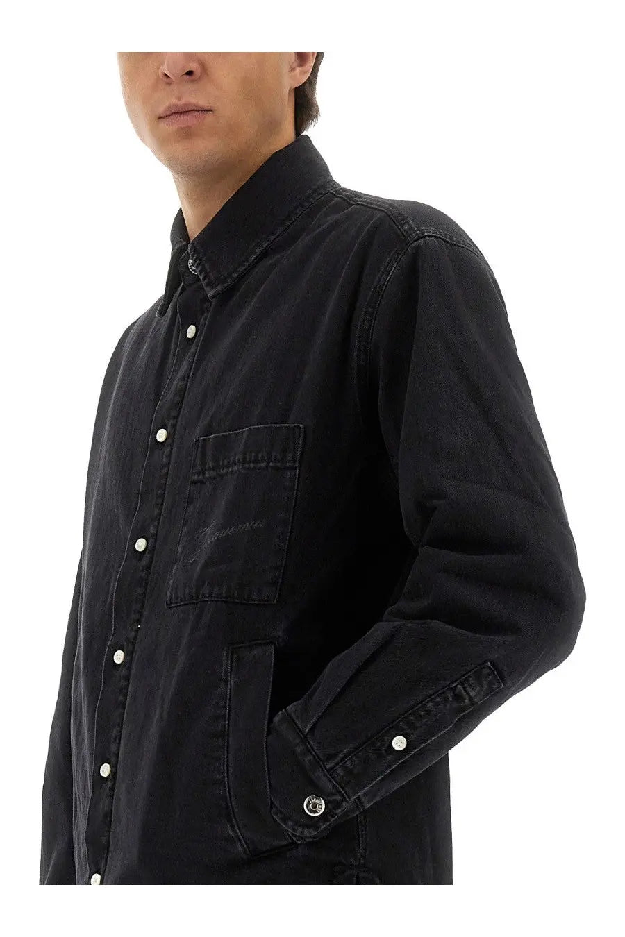 Jacquemus men’s black denim button-up shirt with white buttons and subtle embroidered logo on chest pocket