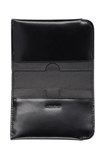 Black leather jacquemus men’s curved wallet with glossy finish and embossed branding on front side