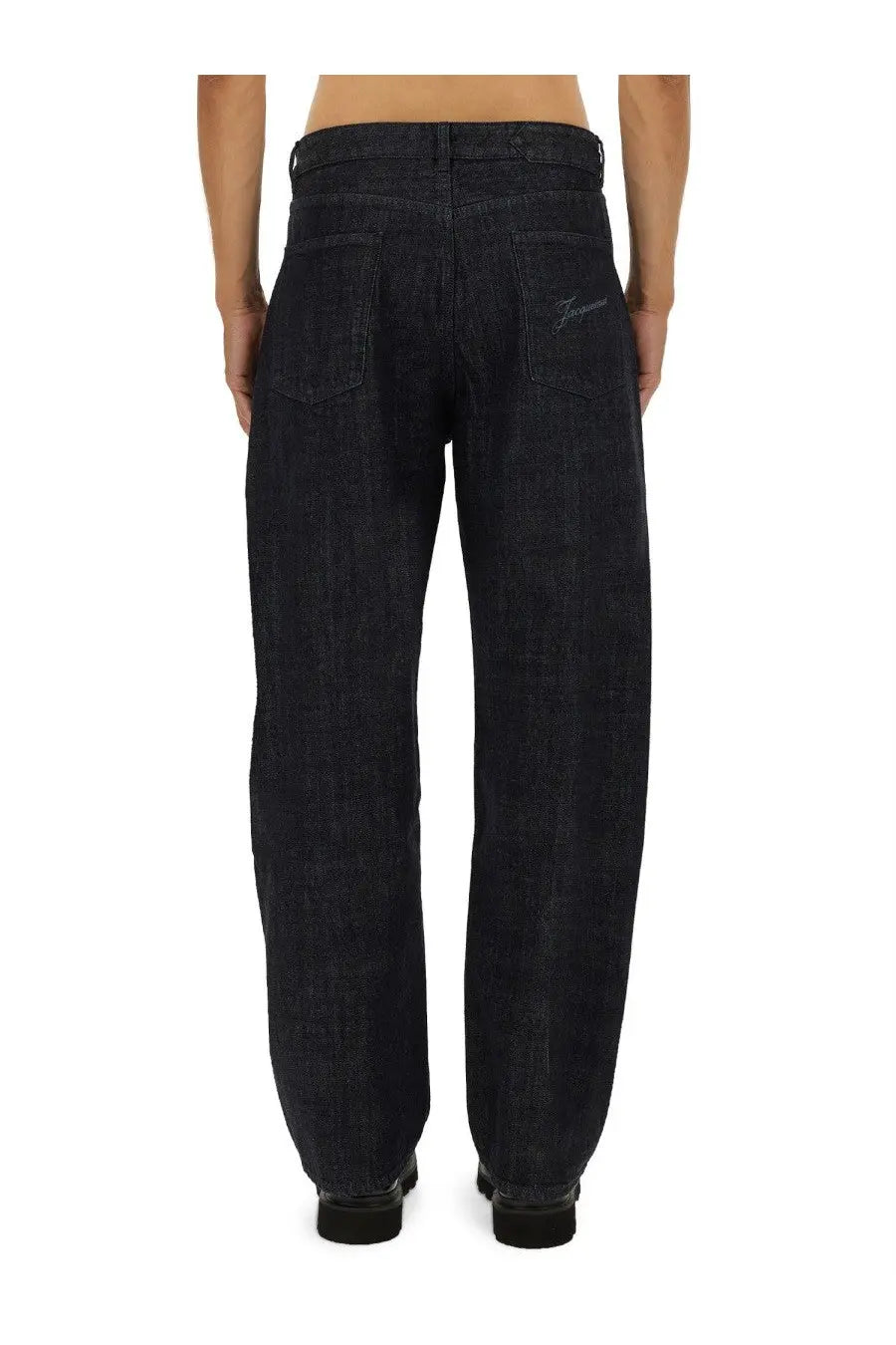 Jacquemus men’s the de nimes mirada pant in dark indigo denim with relaxed wide-leg cut and subtle stitching details