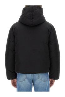 Jacquemus men’s black down puffer jacket with hood and quilted design for cold weather wear