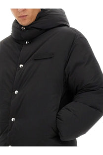 Jacquemus men’s black down puffer jacket la doudoune with hood, silver buttons, and chest patch