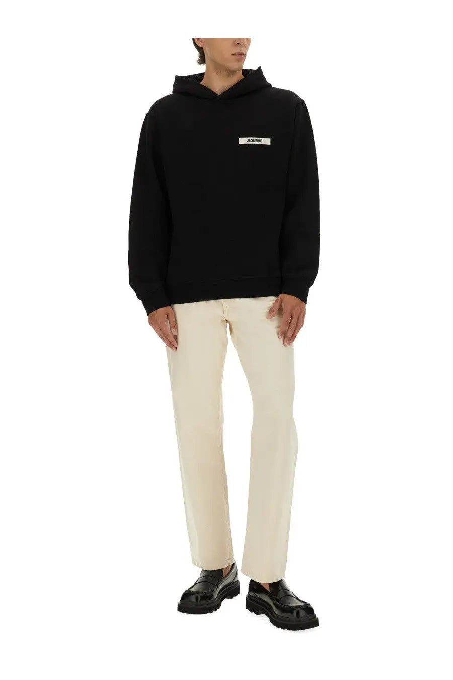 Jacquemus men’s black hooded sweatshirt made of felpa with a white rectangular logo patch on the chest