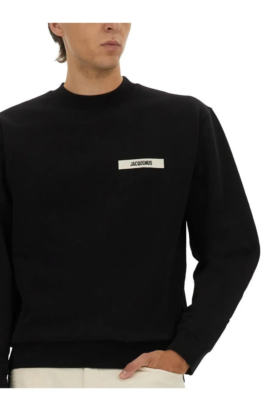 Jacquemus men’s black grosgrain sweatshirt with minimalist white rectangular logo patch on the chest