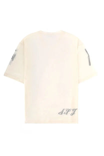 Cream-colored oversized jacquemus men’s le ane mc shirt with subtle silver embroidery on sleeves and lower back showing back side
