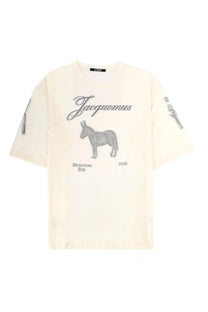 Cream-colored jacquemus men’s le ane mc t-shirt with gray embroidered donkey graphic and printemps été 2026 text