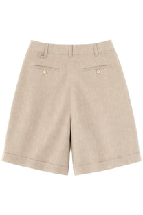 Beige linen jacquemus men’s le shorts pastro with rolled cuffs and buttoned back pockets shown from the back side