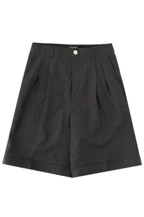Jacquemus men’s black pleated shorts with subtle striped texture and single white button at waistband