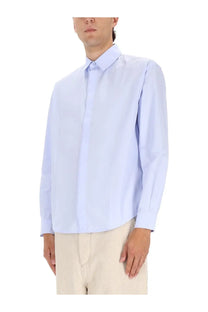 Jacquemus men’s le simon light blue long-sleeved button-down shirt with classic collar and pressed fabric