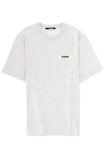 A heather gray jacquemus men’s short-sleeved shirt with a cream label stitched on the left chest