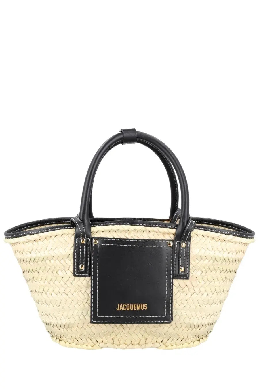 Beige woven straw tote bag with black leather handles and jacquemus logo patch in gold lettering