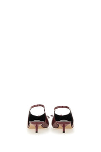 Back view of burgundy patent leather jacquemus womens the cubisto slingbacks mules with small bow detail
