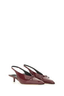 Jacquemus women’s the cubisto slingbacks in red burgundy patent leather with pointed toe and small bow at front