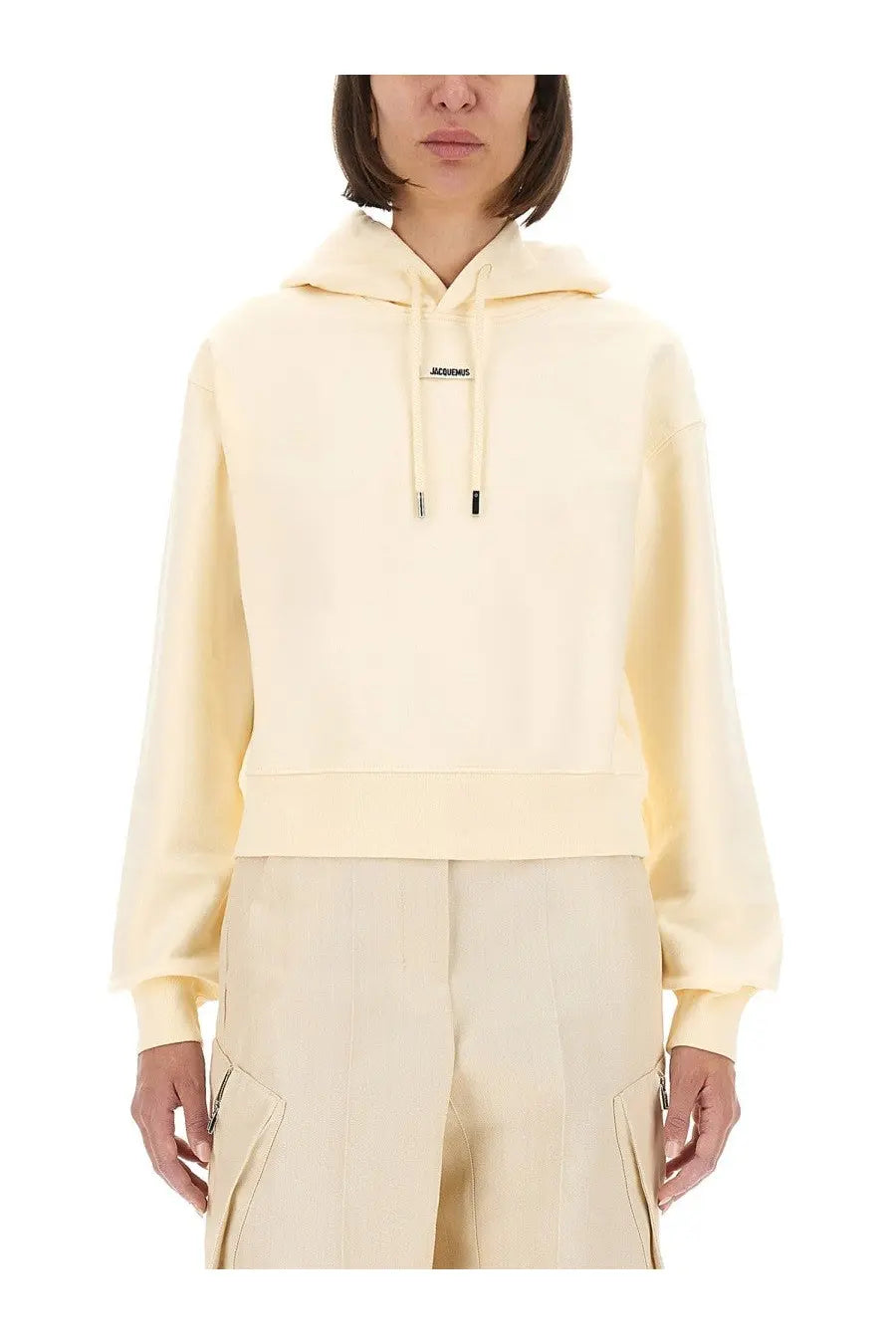 Jacquemus women’s the grosgrain hoodie beige cream-colored cropped with soft textured fabric and black-tipped drawstrings
