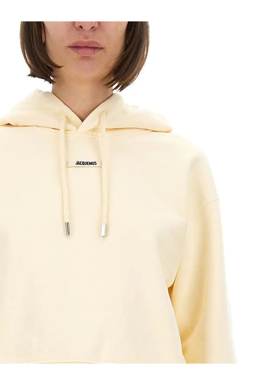 Jacquemus women’s the grosgrain hoodie beige cream color with minimalist design and metallic tipped drawstrings