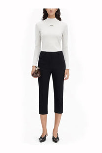 Black cropped trousers with tailored fit and subtle side seam detailing paired with jacquemus white grosgrain shirt