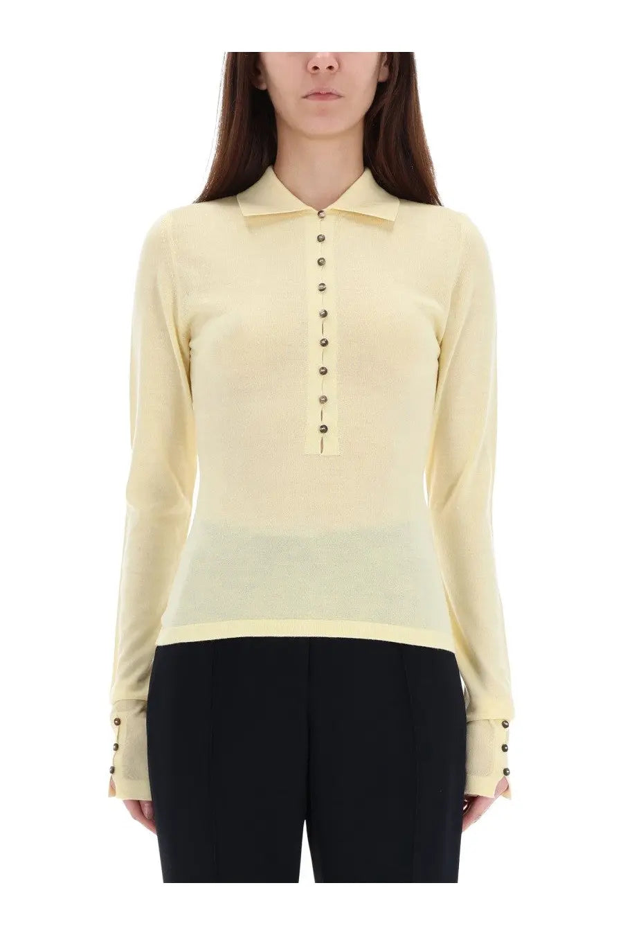 Jacquemus women’s yellow knitted polo shirt with long sleeves subtle sheen and dark metallic buttons down the front