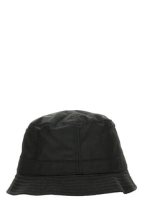 Jacquemus women’s le bob ovalie hat black bucket hat with structured crown and ribbed brim in smooth water resistant fabric