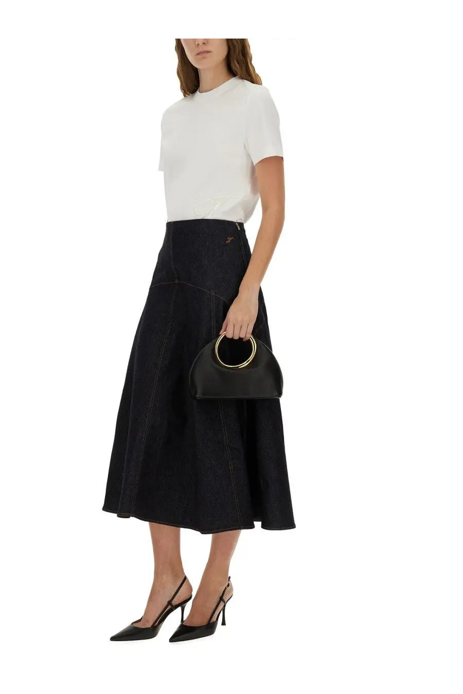 Black leather mini bag with gold-tone circular handle paired with jacquemus women’s white shirt