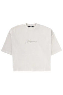 Jacquemus women’s the shirt white off-white cropped t-shirt with subtle silver cursive logo embroidered on chest