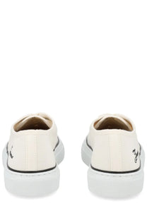 Cream-colored canvas jacquemus women sneaker e e white with black stitching and subtle embroidered logo on the back heel