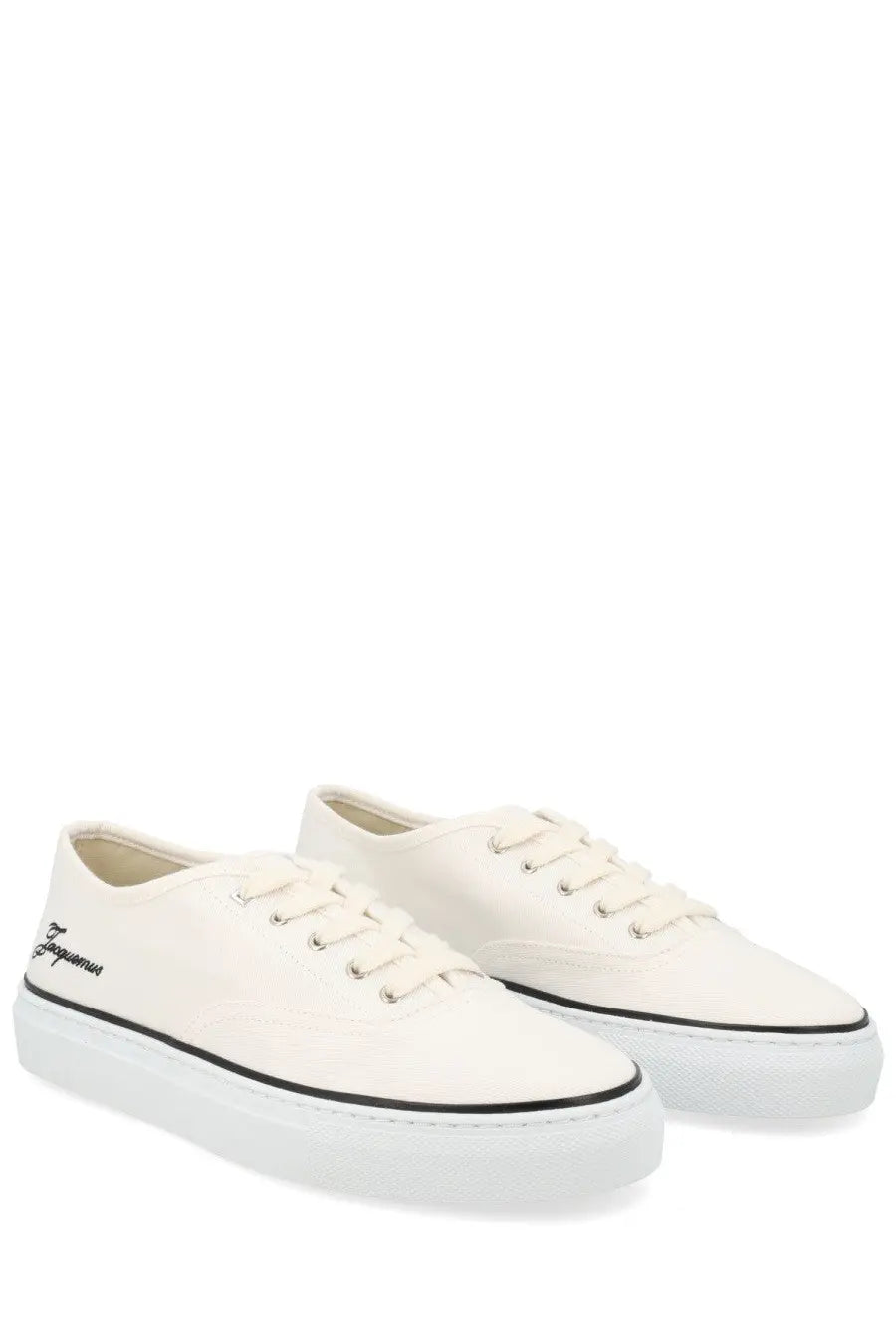 Jacquemus women’s cream canvas sneakers with black laces thin black sole stripe and ferragamo embroidery on side