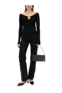 Black leather clutch with minimalist design and gold-tone logo detail by Jacquemus womens the top praluce black