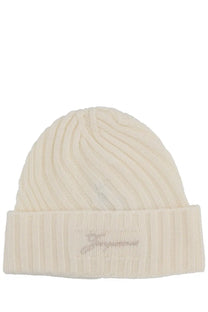 Cream-colored ribbed knit beanie with folded cuff and subtle embroidered logo from Jacquemus womens the Tourni Cap White