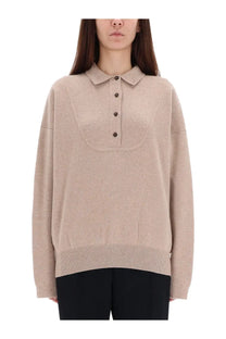 Beige knit polo sweater by Jacquemus featuring soft textured fabric and dark brown buttons