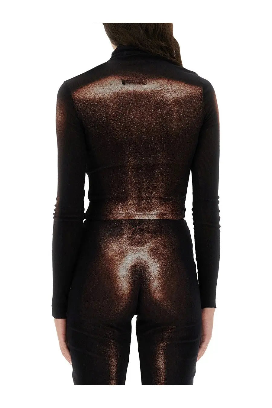 Back view of jean paul gaultier women’s black long-sleeved top with shimmering bronze abstract pattern