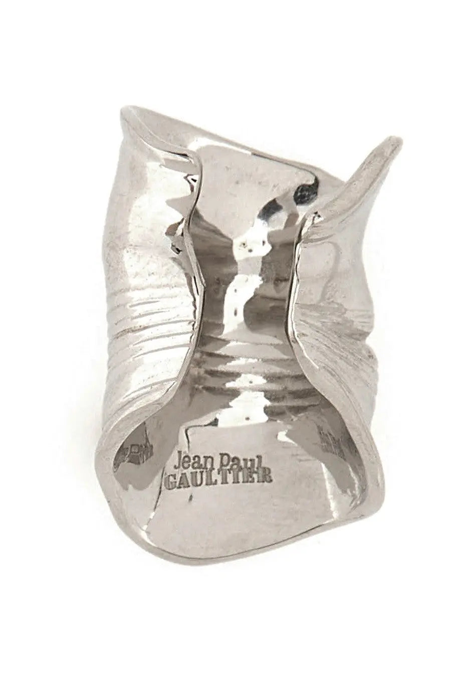 Silver sculpted cuff bracelet with hammered texture and organic flowing design by jean paul gaultier