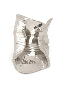 Silver sculpted cuff bracelet with hammered texture and organic flowing design by jean paul gaultier