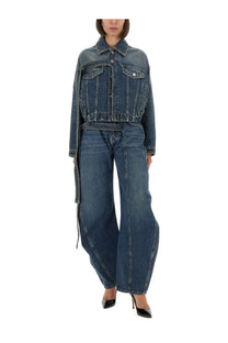 A dark blue denim jacket with a classic collar and two front pockets paired with jean paul gaultier low rise jeans