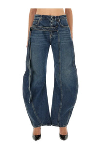 Jean Paul Gaultier women’s low rise dark blue denim jeans with wide-leg cut and distinctive side slit design