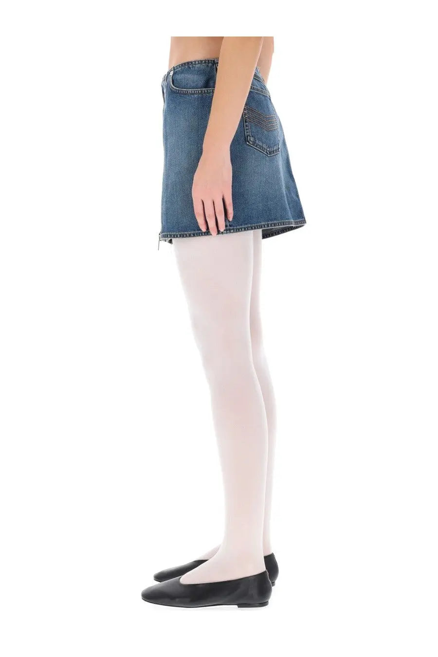 Jean Paul Gaultier women’s classic blue denim miniskirt with flared hem and back pocket detailing shown from the back