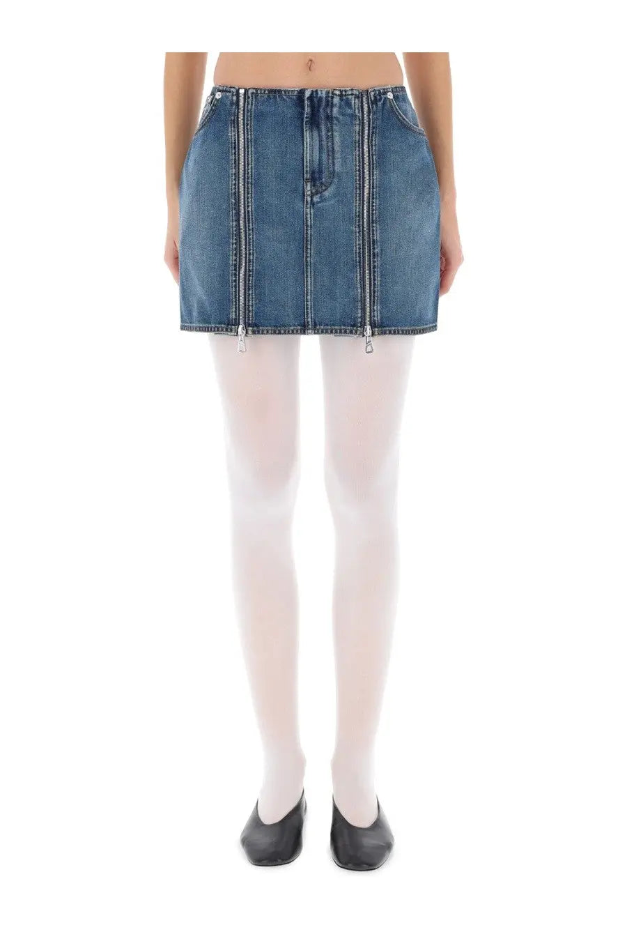 Blue denim mini skirt by Jean Paul Gaultier with front zipper detailing in a casual style for women